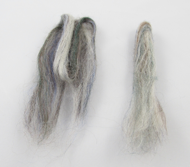 For the hind legs, which are shorter than the front legs, roll the wool between your palms. Then fold the rolled wool in half and wrap some of the loose wool around it. Needle until it is solid. Leave one end loose, so it can be attached to body.