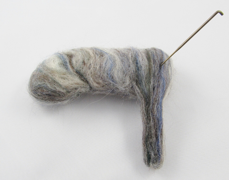 Needle each leg to the body.