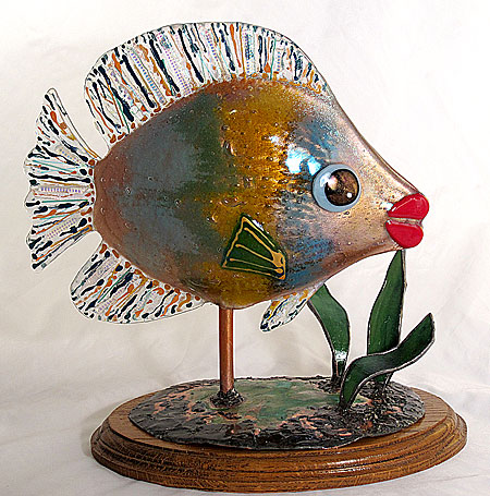 Susan makes fused glass fish. Love the big lips!