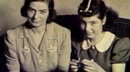 My grandma receives a knitting lesson from my great-grandmother.