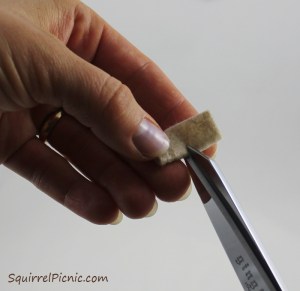 How to embroider a face for squirrel amigurumi tutorial by Squirrel Picnic.