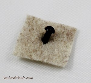 How to embroider a face for squirrel amigurumi tutorial by Squirrel Picnic.