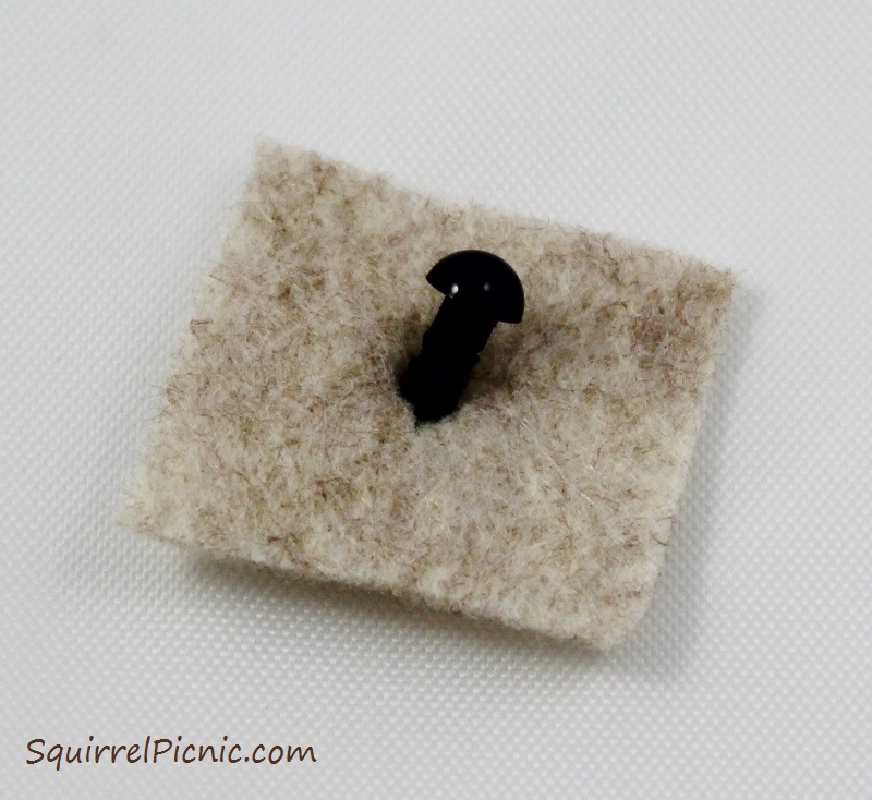 How to embroider a face for squirrel amigurumi tutorial by Squirrel Picnic.