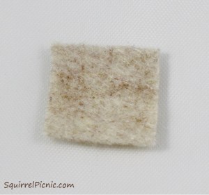 How to embroider a face for squirrel amigurumi tutorial by Squirrel Picnic.