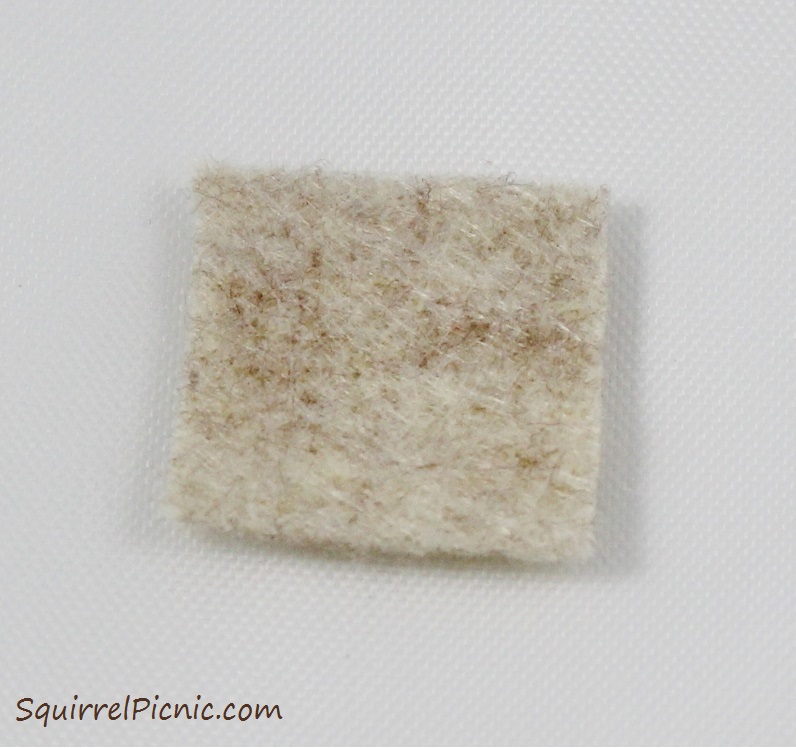 How to embroider a face for squirrel amigurumi tutorial by Squirrel Picnic.