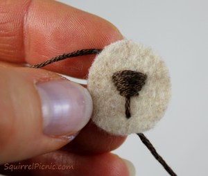 How to embroider a face for squirrel amigurumi tutorial by Squirrel Picnic.