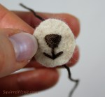 How to embroider a face for squirrel amigurumi tutorial by Squirrel Picnic.