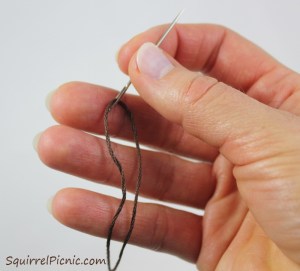 How to embroider a face for squirrel amigurumi tutorial by Squirrel Picnic.