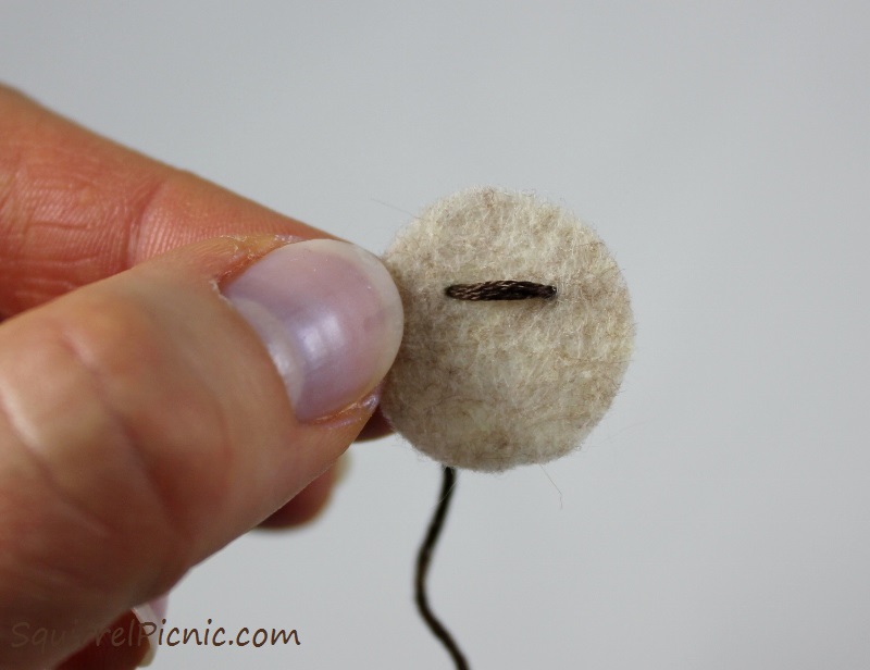 How to embroider a face for squirrel amigurumi tutorial by Squirrel Picnic.