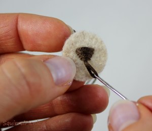 How to embroider a face for squirrel amigurumi tutorial by Squirrel Picnic.
