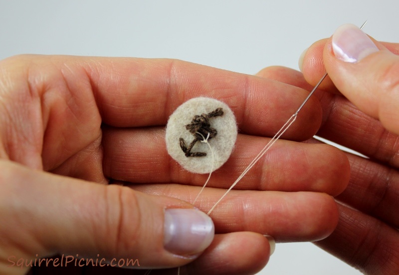 How to embroider a face for squirrel amigurumi tutorial by Squirrel Picnic.