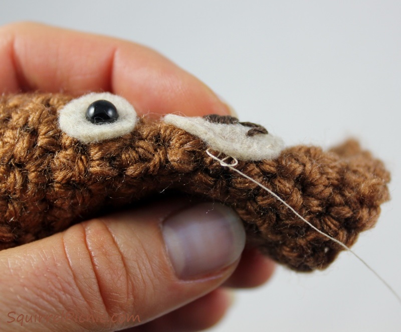 How to embroider a face for squirrel amigurumi tutorial by Squirrel Picnic.