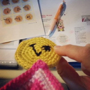 I've found wearing one of the #1 Award Medals while I proofread gives me instant motivation! Patterns for #1 Award Medals for you and your squirrel friend are included in the book.